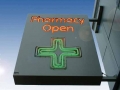 Illuminated double-sided neon projecting Pharmacy sign
