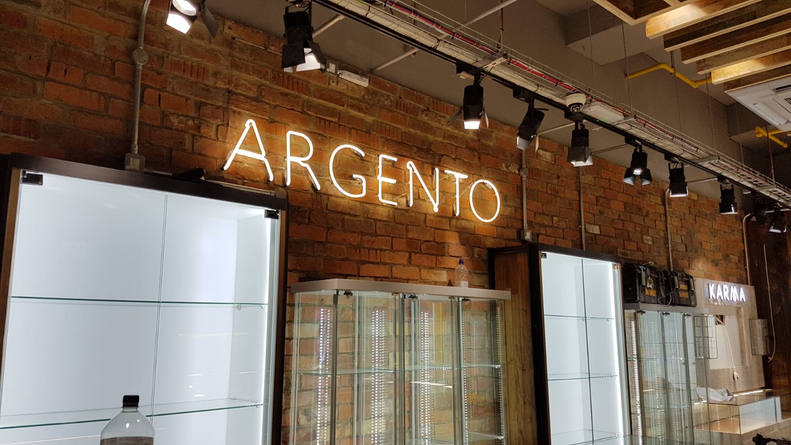 White neon Argento branding